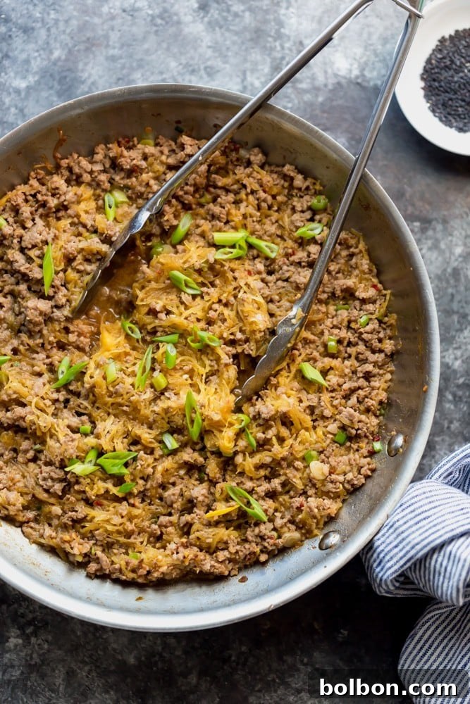 Spaghetti Squash and Pork Stir Fry is a fast and easy low carb dinner with minimal prep. | Quick and Easy Low Carb Dinner Recipe | High Protein Low Carb Dinner Recipes | Low Carb 30 Minute Meals | Low Carb Family Meals | Spaghetti Squash Recipes with Meat | Healthy Spaghetti Squash Recipes | Simple Spaghetti Squash Recipe | How to cook spaghetti Squash