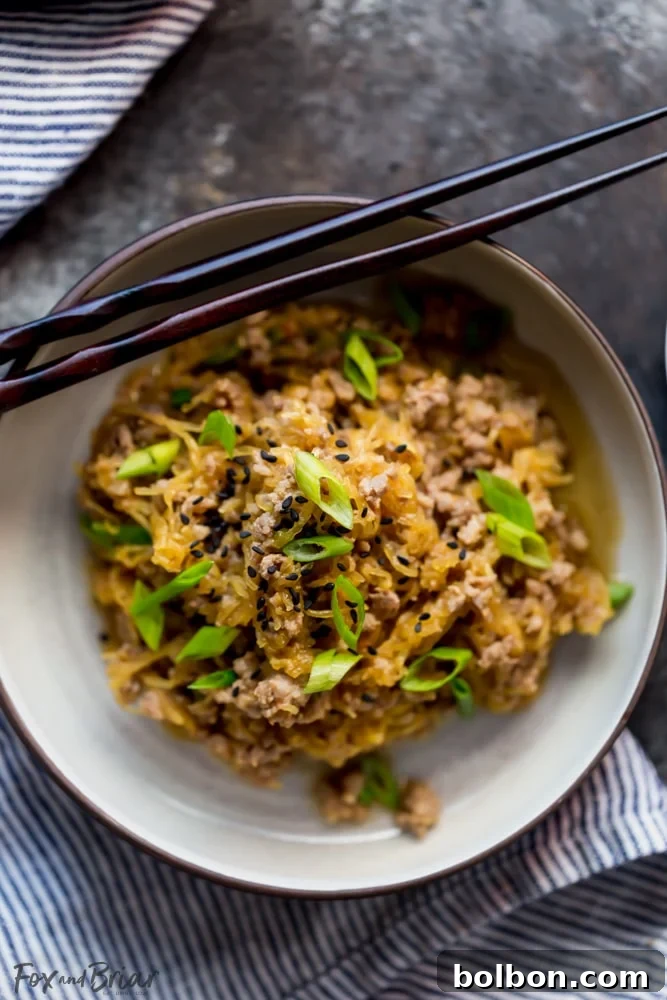 Spaghetti Squash and Pork Stir Fry is a fast and easy low carb dinner with minimal prep. | Quick and Easy Low Carb Dinner Recipe | High Protein Low Carb Dinner Recipes | Low Carb 30 Minute Meals | Low Carb Family Meals | Spaghetti Squash Recipes with Meat | Healthy Spaghetti Squash Recipes | Simple Spaghetti Squash Recipe | How to cook spaghetti Squash