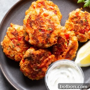 Quick Salmon Cakes 6 A main image of the finished salmon patties, golden and crispy, on a serving plate, ready to be enjoyed.