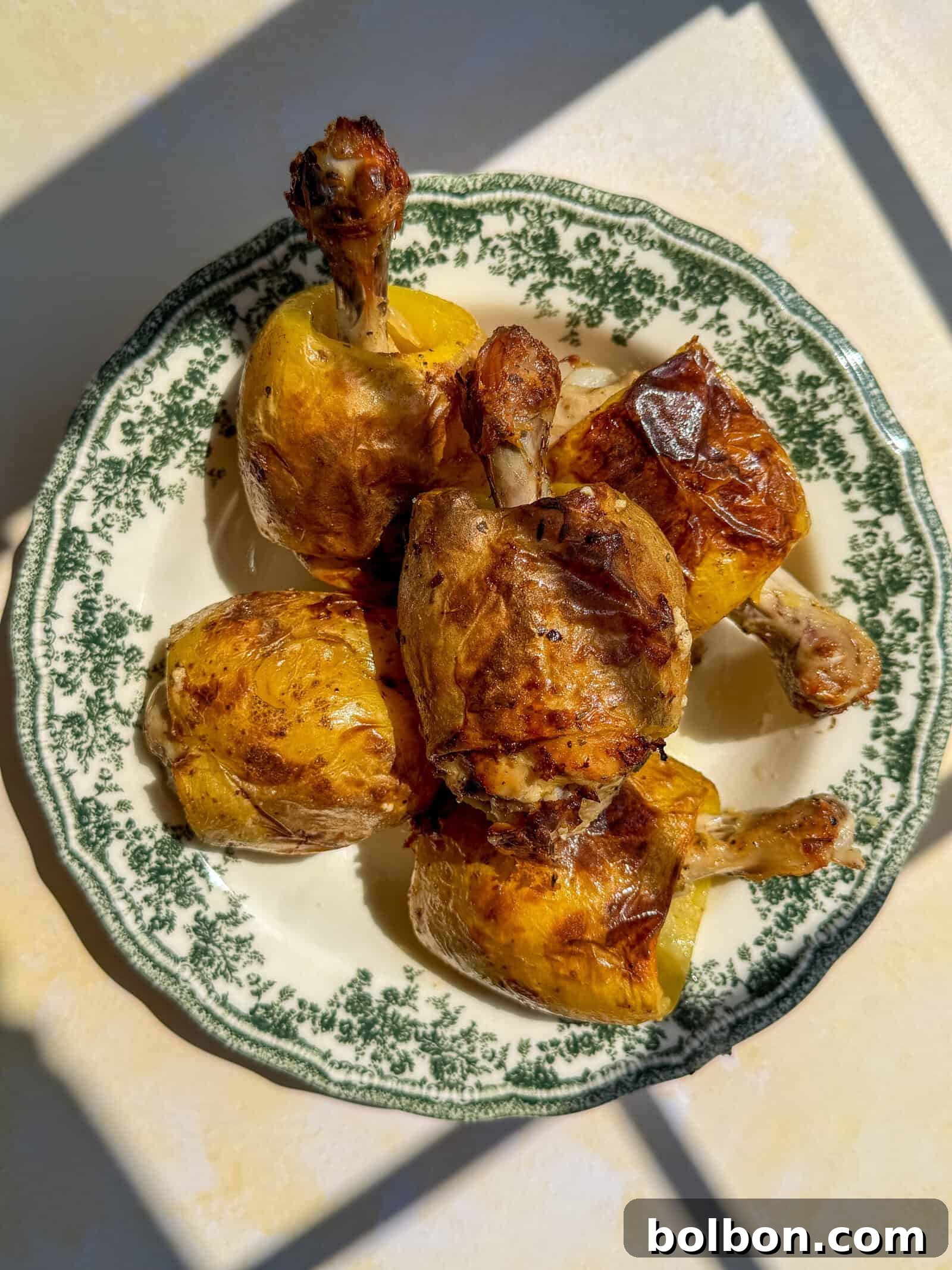 a plate full of chicken in a potato