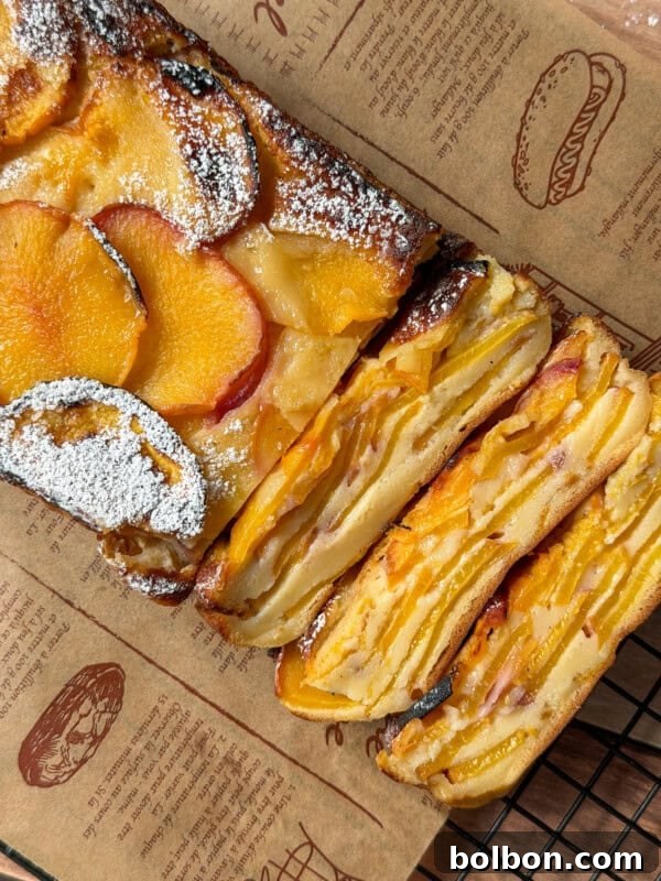 Invisible Peach Cake Recipe: Thin-Sliced Peach Dessert 3 Invisible peach cake on parchment paper