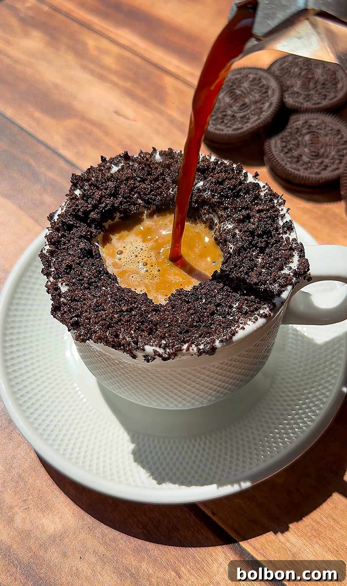Oreo Affogato Recipe: Coffee, Ice Cream & Crushed Oreos 2 Espresso poured into Oreo cookie-rimmed coffee cup
