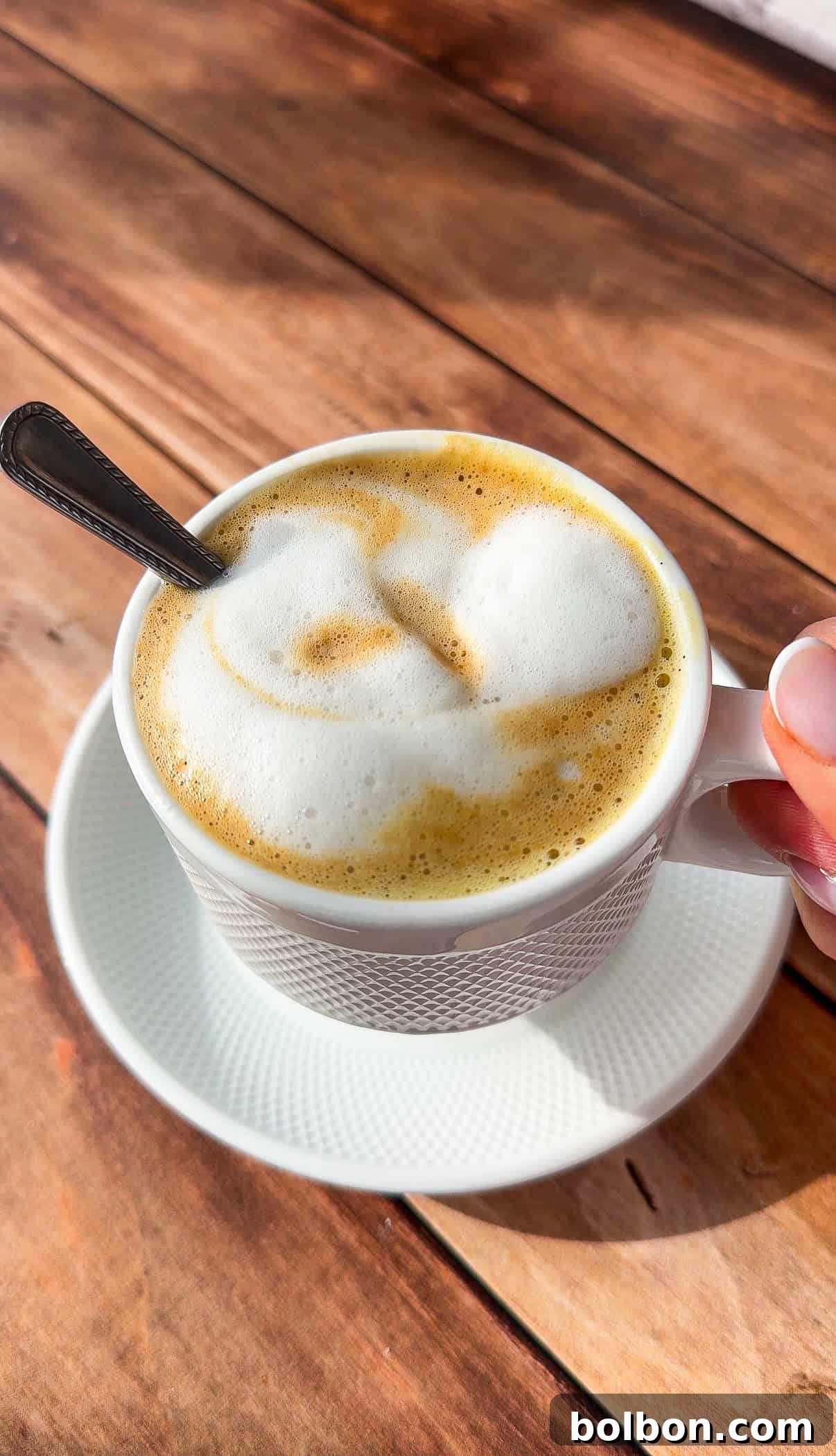 Oreo Affogato Recipe: Coffee, Ice Cream & Crushed Oreos 7 A cup of viral egg coffee topped with frothy milk foam