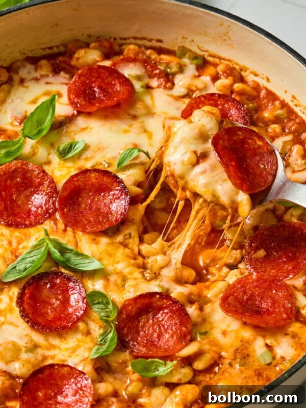 Creamy Butter Chicken Beans: Indian-Spiced Bean Curry 4 Cheesy pepperoni pizza beans in a skillet
